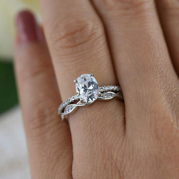 1.5 Carat Oval Cut Swirl Bridal Ring Set in White Gold over Sterling Silver