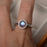 1.25 Carat Round Cabochon Cut Blue Moonstone and Diamond Halo Engagement Ring in White Gold