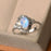 Vintage 1.50 Carat Oval Cut Blue Moonstone and Diamond Floral Engagement Ring in White Gold