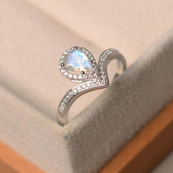 Channel Setting 1.50 Carat Pear Shape Blue Moonstone and Diamond Halo Engagement Ring in White Gold