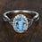 Lovely 1.25 Carat Aquamarine and Diamond Oval Cut Halo Engagement Ring in White Gold