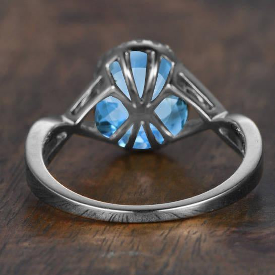 Lovely 1.25 Carat Aquamarine and Diamond Oval Cut Halo Engagement Ring in White Gold
