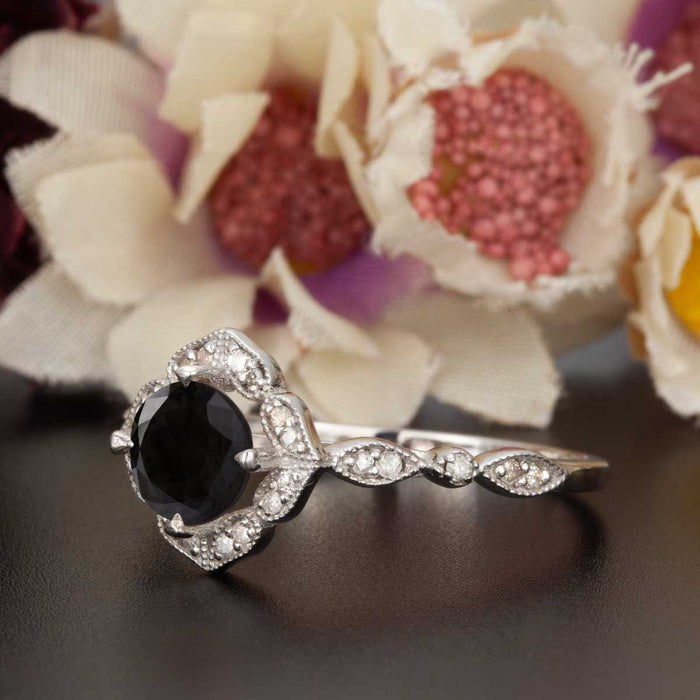 Vintage 1.25 Carat Round Cut Black Diamond and Diamond Engagement Ring in White Gold