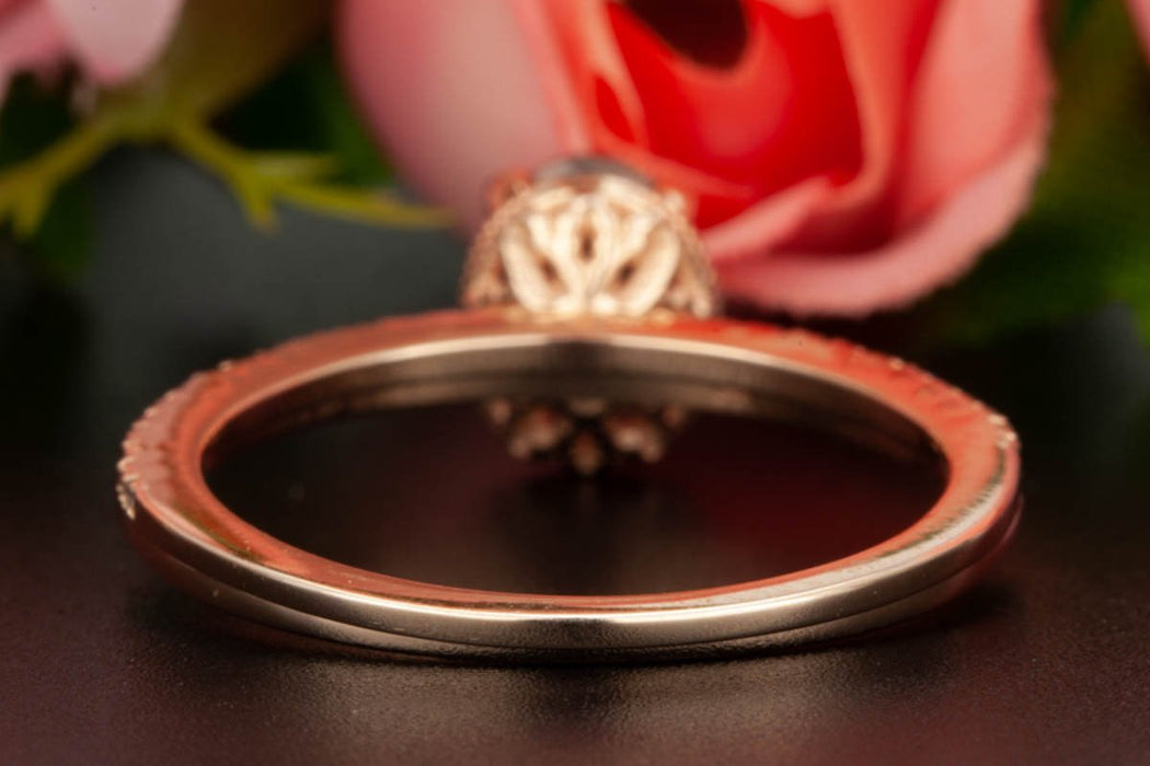 Elegant 1.50 Carat Oval Cut Black Diamond and Diamond Wedding Ring Set in Rose Gold