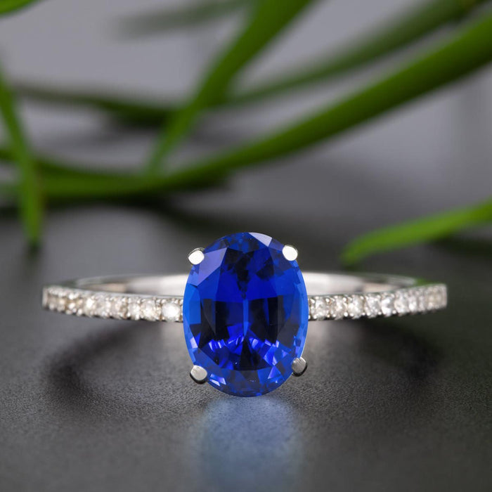 Flawless 1.25 Carat Oval Cut Sapphire and Diamond Engagement Ring in White Gold