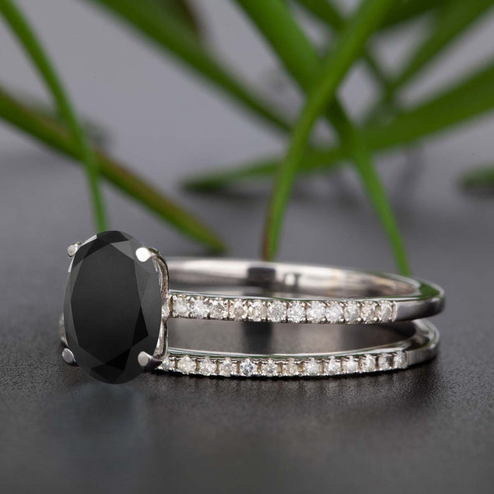 Flawless 1.50 Carat Oval Cut Black Diamond and Diamond Bridal Ring Set in White Gold