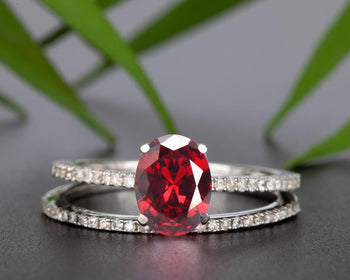 Flawless 1.5 Carat Oval Cut Ruby and Diamond Engagement Ring and Matching Wedding Band in 9k White Gold
