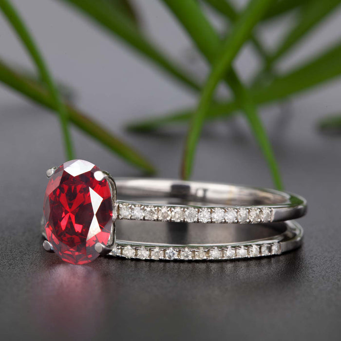 Flawless 1.5 Carat Oval Cut Ruby and Diamond Engagement Ring and Matching Wedding Band in 9k White Gold