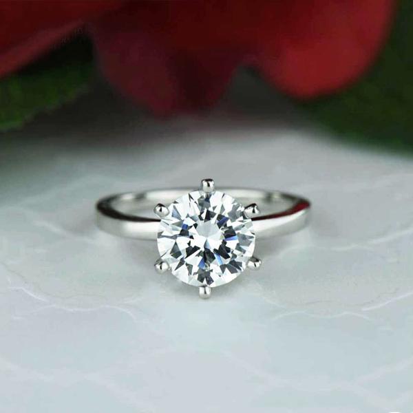Silver solitaire deals ring