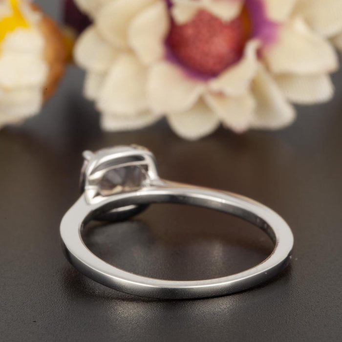 Splendid 1.25 Carat Cushion Cut Sapphire and Diamond Engagement Ring in 9k White Gold
