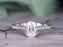 1.25 Carat Oval Cut Moissanite and Diamond Engagement Ring in 9k White Gold