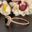 1.25 Carat Cushion Cut Halo Black Diamond and Diamond Engagement Ring in Rose Gold