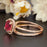 1.5 Carat Cushion Cut Halo Ruby and Diamond Wedding Ring Set in 9k Rose Gold