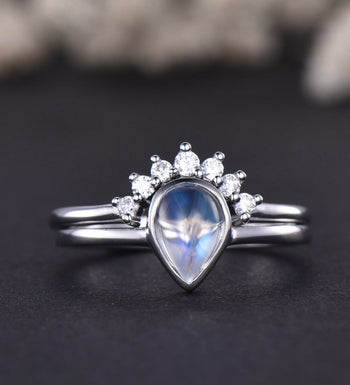 Bezel 1.25 Carat Pear Shape Blue Moonstone and Diamond Wedding Set with Crown Band in White Gold