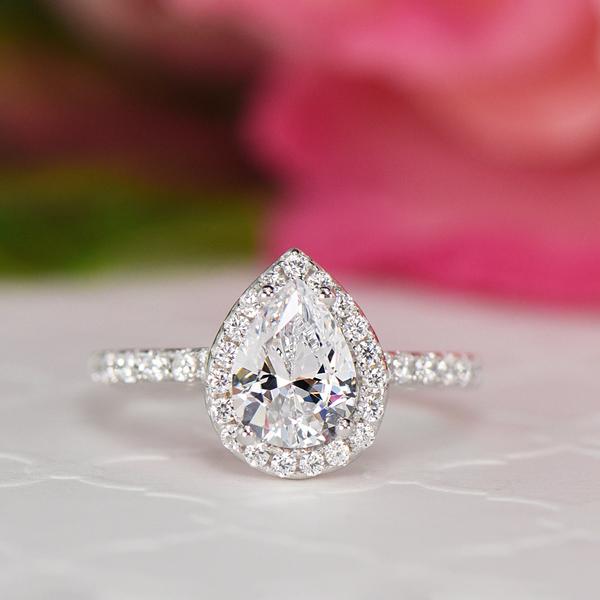 1.5 Carat Pear Cut Halo Engagement Ring in White Gold over Sterling Silver