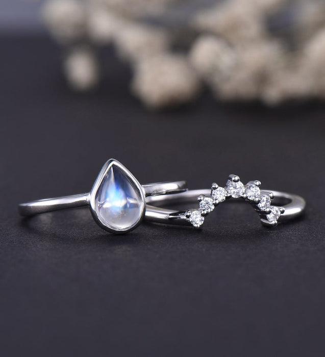 Bezel 1.25 Carat Pear Shape Blue Moonstone and Diamond Wedding Set with Crown Band in White Gold