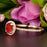1.25 Carat Round Cut Halo Ruby and Diamond Engagement Ring in 9k Rose Gold