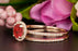 1.5 Carat Round Cut Halo Ruby and Diamond Wedding Ring Set in 9k Rose Gold