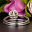 1.5 Carat Round Cut Halo Ruby and Diamond Wedding Ring Set in 9k White Gold