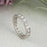 0.5 Carat Engraved Eternity Wedding Band in White Gold over Sterling Silver
