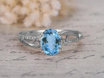 Marvellous 1.25 Carat Oval Cut Aquamarine and Diamond Engagement Ring in White Gold