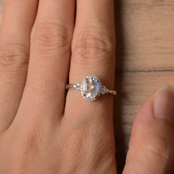 Vintage 1.50 Carat Oval Cut Blue Moonstone and Diamond Halo Engagement Ring in White Gold