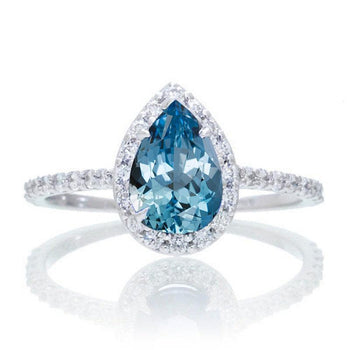 Elegant 1.50 Carat Pear Cut Aquamarine and Diamond Halo Engagement Ring in White Gold