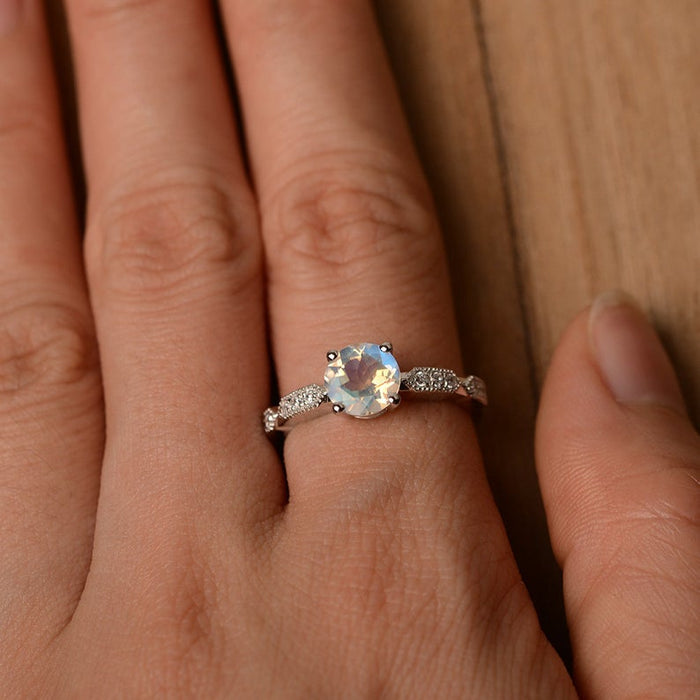 Antique 1.25 Carat Round Cut Blue Moonstone and Diamond Milgrain Engagement Ring in White Gold