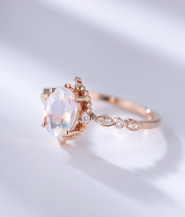 Vintage Inspired 1.25 Carat Oval Cut Rainbow Moonstone and Diamond Engagement Ring in Rose Gold