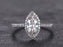 1.25 Carat Marquise Cut Moissanite and Diamond Engagement Ring in White Gold