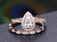 2 Carat Pear Cut Moissanite and Diamond Wedding Ring Set in Rose Gold