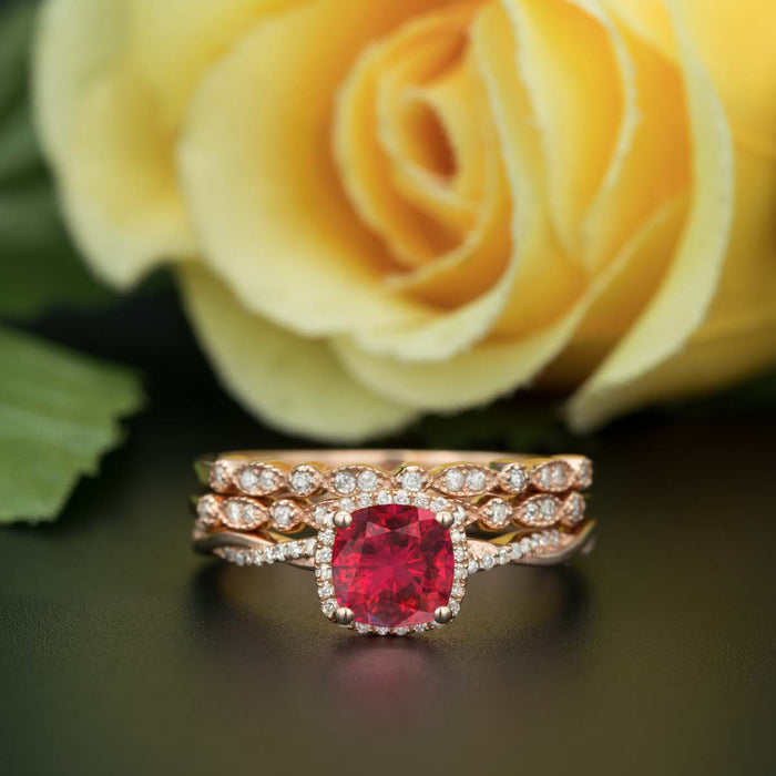 Unique 2 Carat Cushion Cut Ruby and Diamond with 2 Matching Wedding Bands in 9k Rose Gold