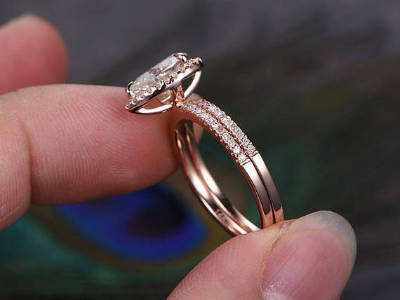 2 Carat Pear Cut Moissanite and Diamond Halo Bridal Set in Rose Gold