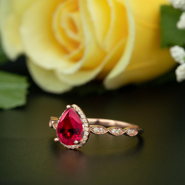 1.25 Carat Pear Cut Halo Ruby and Diamond Engagement Ring in 9k Rose Gold Vintage Ring