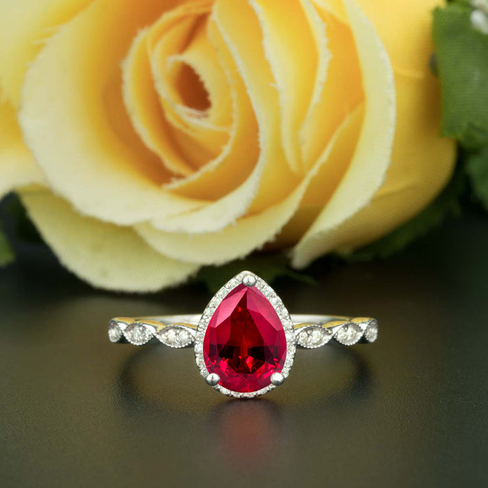 1.25 Carat Pear Cut Halo Ruby and Diamond Engagement Ring in 9k White Gold Vintage Ring