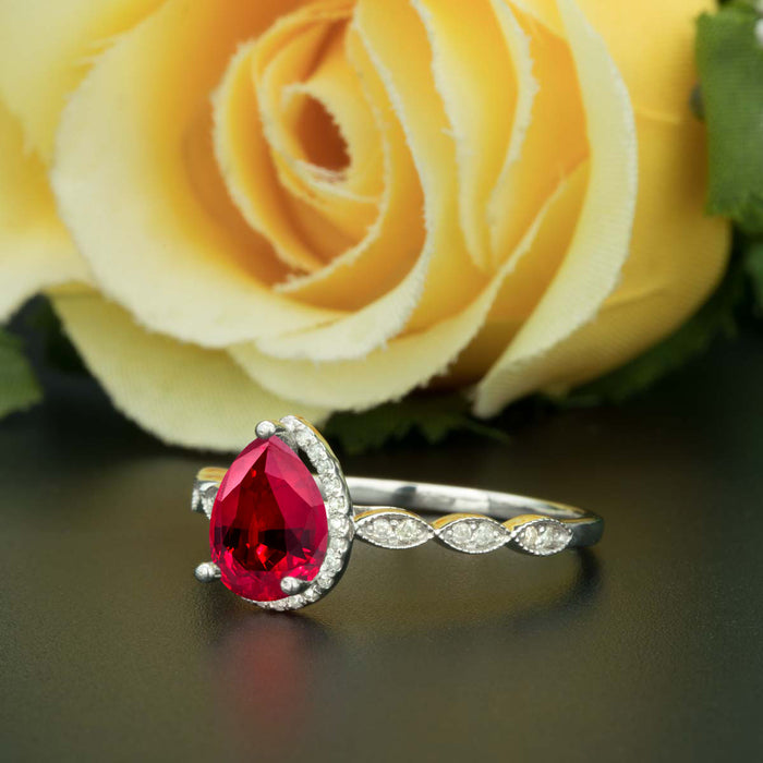 1.25 Carat Pear Cut Halo Ruby and Diamond Engagement Ring in 9k White Gold Vintage Ring