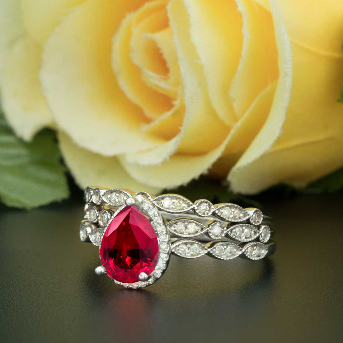 2 Carat Pear Cut Halo Ruby and Diamond Trio Wedding Ring Set in 9k White Gold Vintage Ring