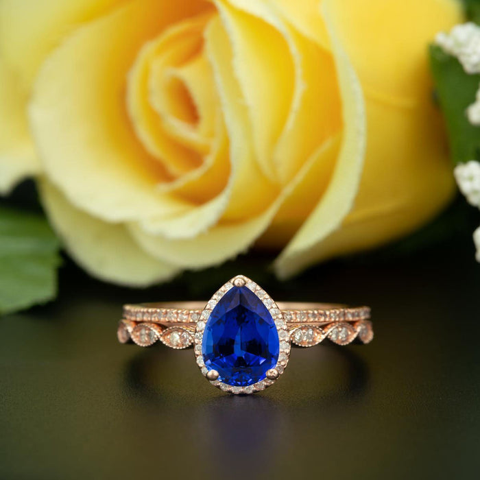 1.50 Carat Pear Cut Halo Sapphire and Diamond Bridal Ring Set in Rose Gold