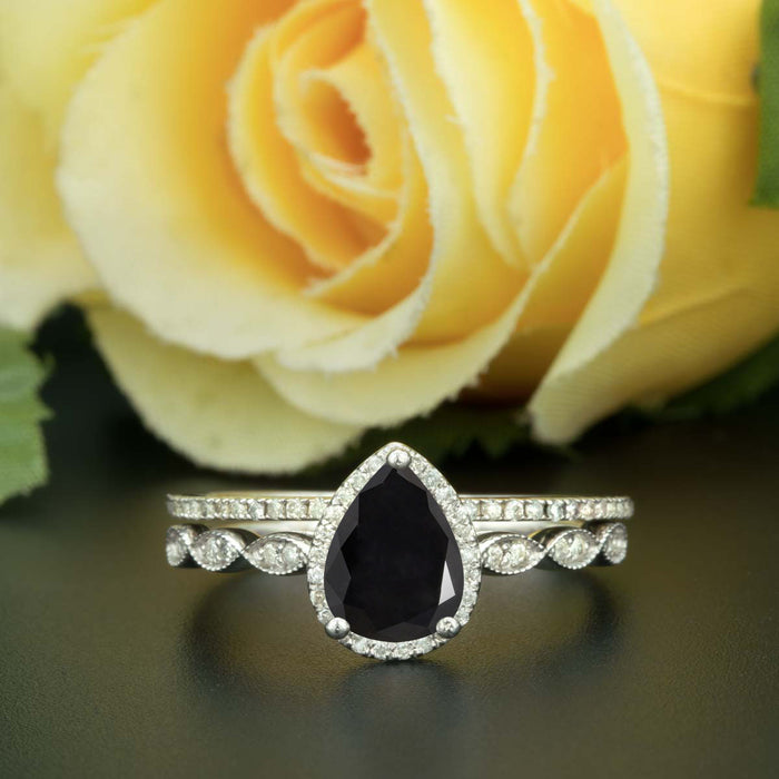 1.5 Carat Pear Cut Halo Black Diamond and Diamond Ring with Classic Wedding Band in 9k White Gold