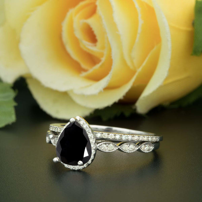1.5 Carat Pear Cut Halo Black Diamond and Diamond Ring with Classic Wedding Band in 9k White Gold
