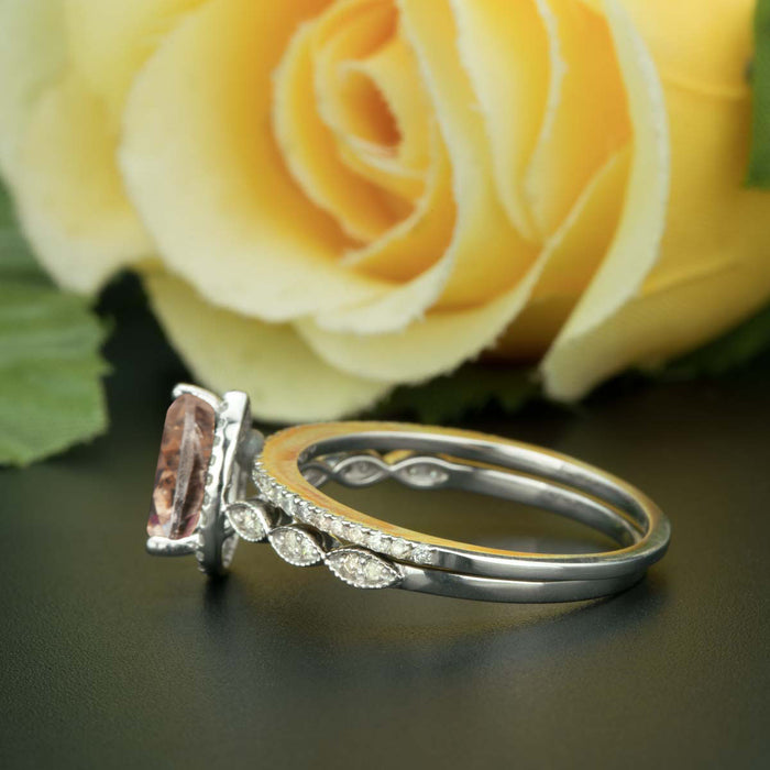1.5 Carat Pear Cut Halo Ruby and Diamond Ring with Classic Wedding Band in 9k White Gold