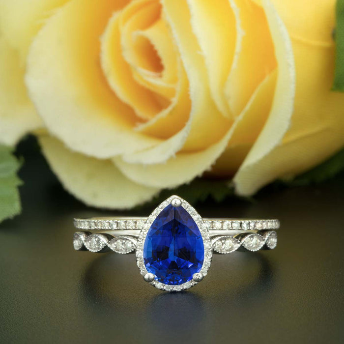 1.50 Carat Pear Cut Halo Sapphire and Diamond Bridal Ring Set in White Gold