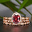 Timeless 2 Carat Oval Cut Ruby and Diamond Trio Bridal Ring Set in 9k Rose Gold