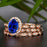 Timeless 2 Carat Oval Cut Sapphire and Diamond Trio Bridal Ring Set in Rose Gold