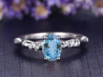 Beautiful 1.25 Carat Oval Cut Aquamarine and Diamond Engagement Ring in White Gold