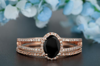 Elegant 1.50 Carat Oval Cut Black Diamond and Diamond Bridal Ring Set in Rose Gold