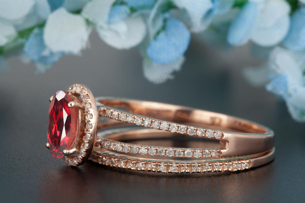 Elegant 1.5 Carat Oval Cut Ruby and Diamond Engagement Ring with Matching Wedding Band in 9k Rose Gold