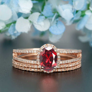 Elegant 2 Carat Oval Cut  Ruby and Diamond Engagement Ring with 2 Matching Wedding Bands in 9k Rose Gold