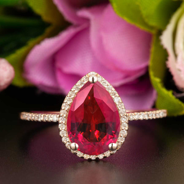 Classic 1.25 Carat Pear Cut Ruby and Diamond Engagement Ring in 9k Rose Gold