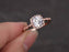 1.50 Carat Round Cut Moissanite and Diamond Halo Wedding Ring in Rose Gold